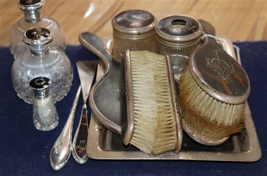 Twelve silver and tortoiseshell dressing table items, including Horton & Allday, Birmingham, 1922/3/4, tray 28.8cm.